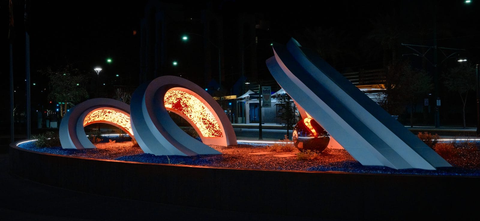 Strata, a monumental illuminated sculpture at Mesa City Hall at night